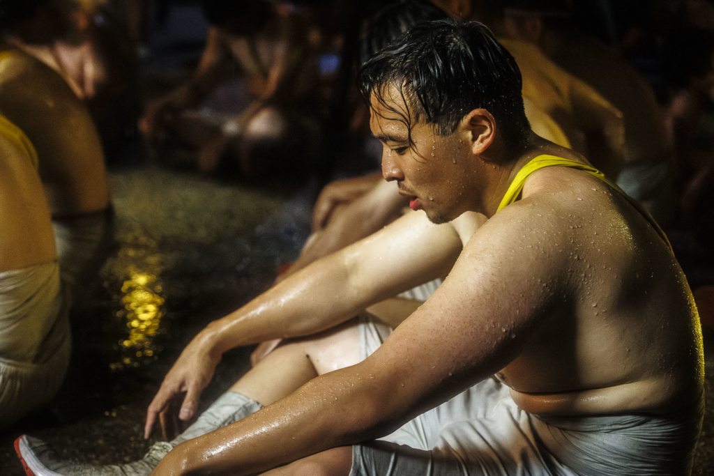 A man rests after the festival