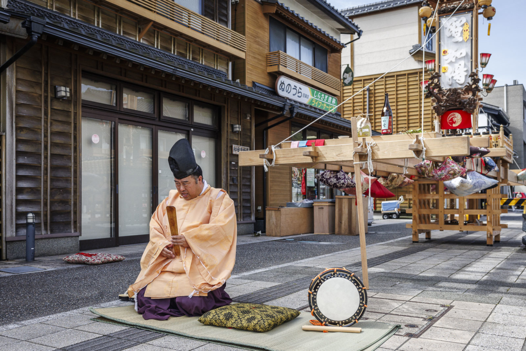 Shinto priest blessing Kiriko lantern float